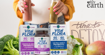 Woman surrounded by fresh whole foods and natural detox ingredients for a spring body cleanse plus more