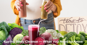 Woman holding juice with cruciferous vegetables and detox sign The Only Earth High Point NC has detox cleanse supplements available