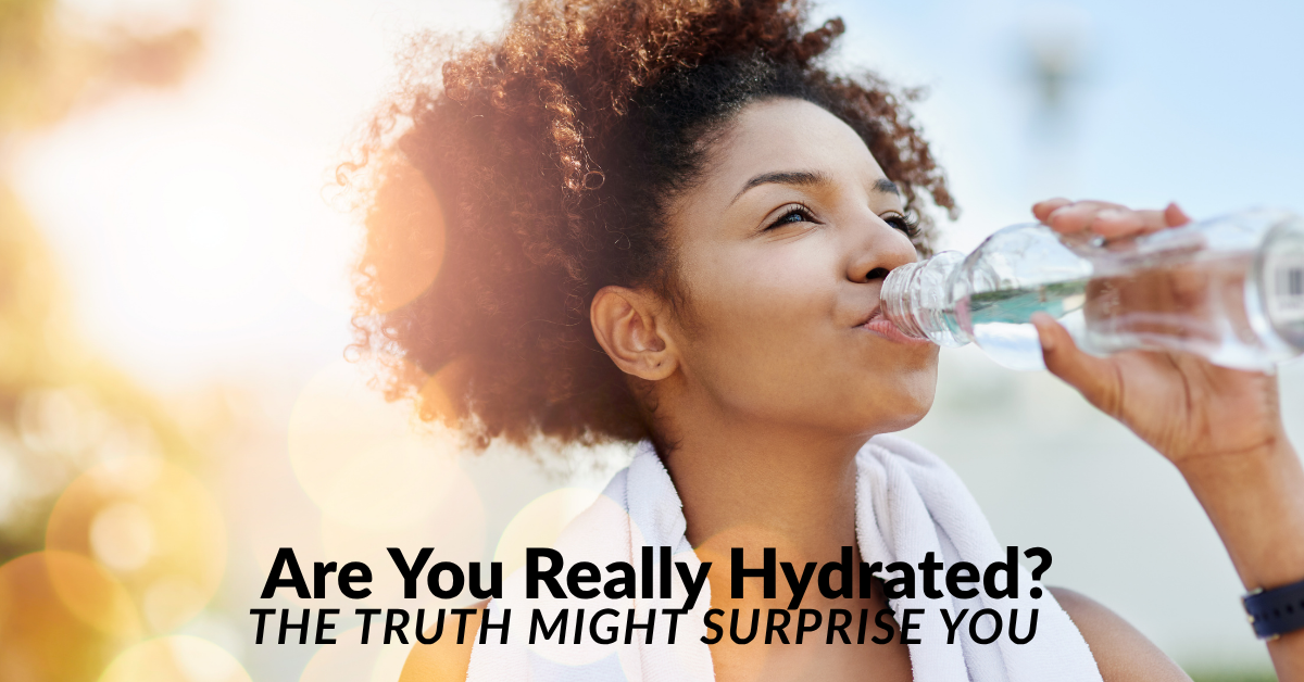 Woman dehydrated and thirsty drinking water illustrating surprising dehydration causes The Only Earth High Point NC