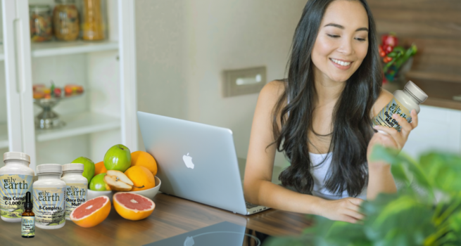Woman ordering The Only Earth supplements online from laptop High Point NC